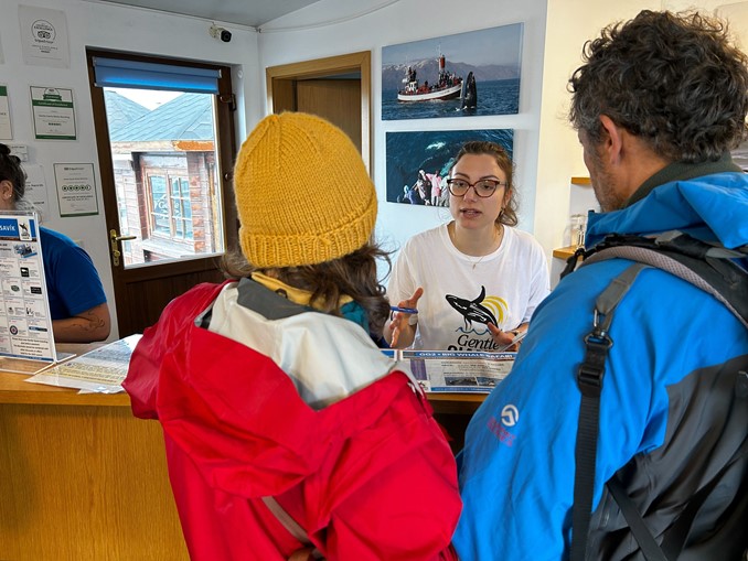 Ticket Center Staff selling tickets